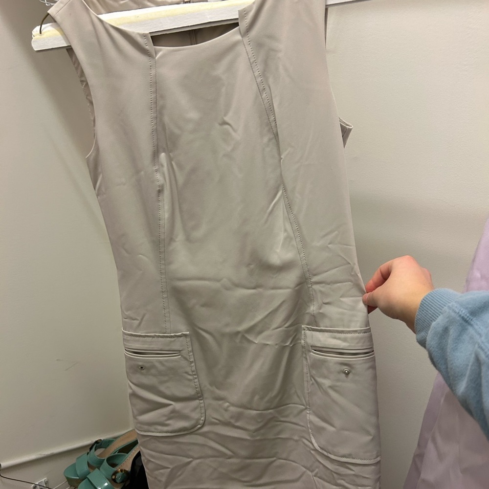 Calvin Klein sleeveless dress. Pockets on side. Zippered back